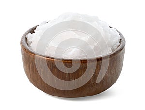 Brown bowl of coconut oil on white background