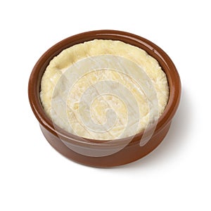 Brown bowl with soft Saint Marcellin cheese