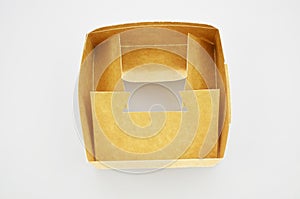 Brown box. Closed, blank.