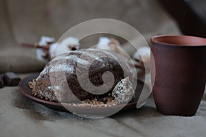 Brown bread on burlap background