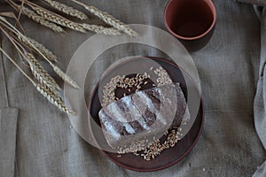 Brown bread on burlap background