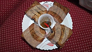 Brown bread omlet with pepper along with dhania chatni and lal mirch