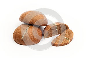 Brown breads with cheese filling on white background