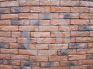 Brown brick block wall show Pattern stack block rough surface texture material background Weld the joints with cement grout red