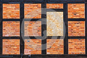 Brown brick wall as grunge background