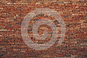 Brown brick wall use as multipurpose background backdrop