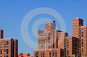 Brown buildings against blue sky