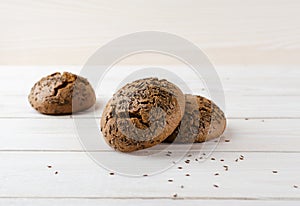 Brown buns sprinkled with caraway seeds