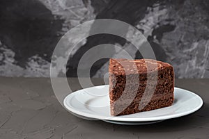 Brown cake isolated on the black background