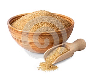 Brown cane sugar in bowl and scoop