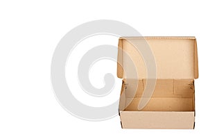 Brown cardboard box for packaging and delivery, isolated on white background, copy space template