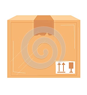 Brown cardboard box sealed with tape, fragile symbol on side. Package ready for shipping or storage. E-commerce and