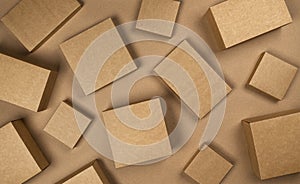 Brown cardboard boxes on craft paper background, top view