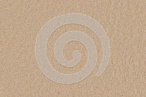 Brown cardboard seamless texture, smooth rough paper background. photo