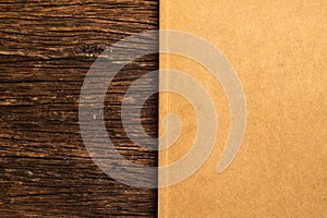 Brown cardboard sheet of paper background on old wooden rustic texture background eco concept idea