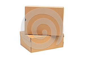 Brown cardboard shoes box with lid for shoe or sneaker product packaging mockup, isolated on white with clipping path