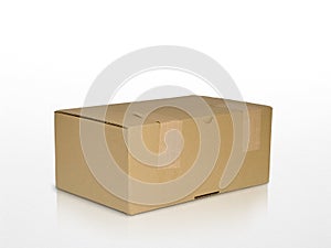 Brown carton box isolated on white with reflection