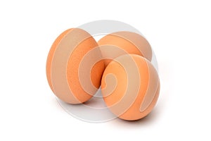 Brown chicken egg isolated on white.