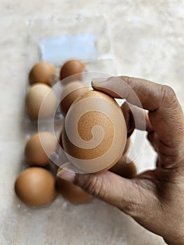 Brown chicken eggs in a plastic package