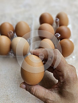 Brown chicken eggs in a plastic package