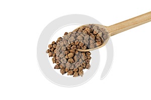 brown chickpeas on wooden spoon isolated on white background.