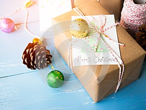 Brown christmas gift boxes with card.