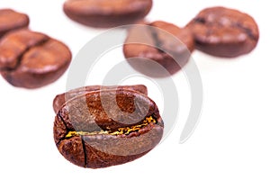 Brown coffee beans isolated white background