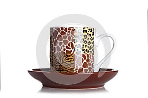 Brown coffee cup on white background with tiger print