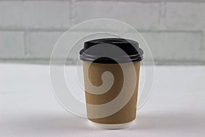 Brown coffee mock up on blank background for design any ideas. Paper mug cup template for cafe or restaurant create identity set.