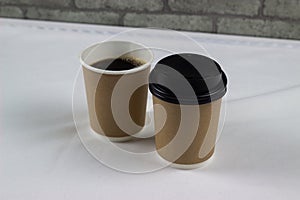 Brown coffee mock up on blank background for design any ideas. Paper mug cup template for cafe or restaurant create identity set.