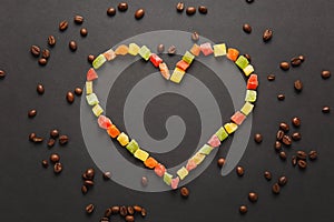 Brown coffee solated on black texture background for design. Saint Valentine's Day card on fabruary 14, holiday concept.