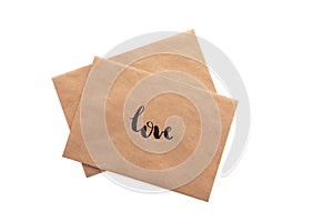 Brown color envelope with hand writing word love