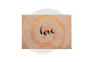 Brown color envelope with hand writing word love