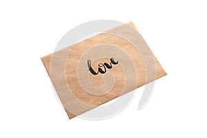 Brown color envelope with hand writing word "love