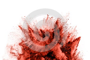 Brown color powder explosion on white background.