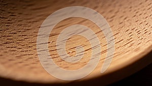 Brown color and visible grain structure suggest it is made from