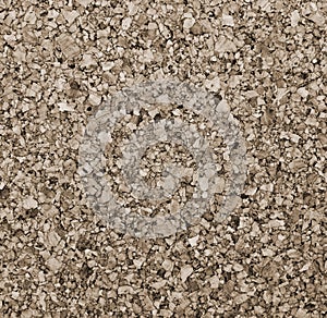 Brown cork board texture as background. In Sepia toned. Retro