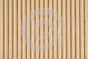 Brown corrugated fiberboard sheet texture or background photo