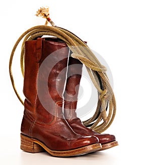 Brown cowboy boots and a Lasso