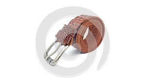 Brown crocodile leather belt on isolated white