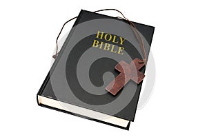 Brown crucifix and Holy Bible book. Religion concept