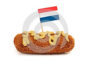Brown crusty dutch kroket with mustard topping isolated