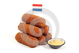 Brown crusty dutch kroketten with dutch flag