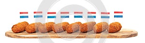 Brown crusty dutch kroketten on a serving tray isolated