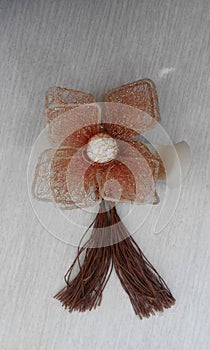 Brown Decorative Flower with Tassle photo