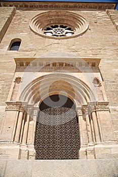 Brown door of cathedral at Lleida city photo