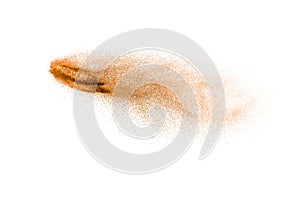 Brown dry river sand explosion isolated on white background. Abstract sand splashing