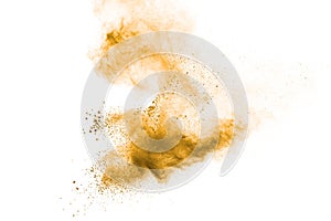 Brown dust cloud.Brown particles splattered on white background