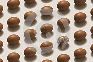 Brown easter eggs aligned on white background
