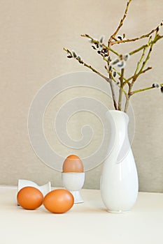 brown easter eggs on the table. Eggs chicken on beige background